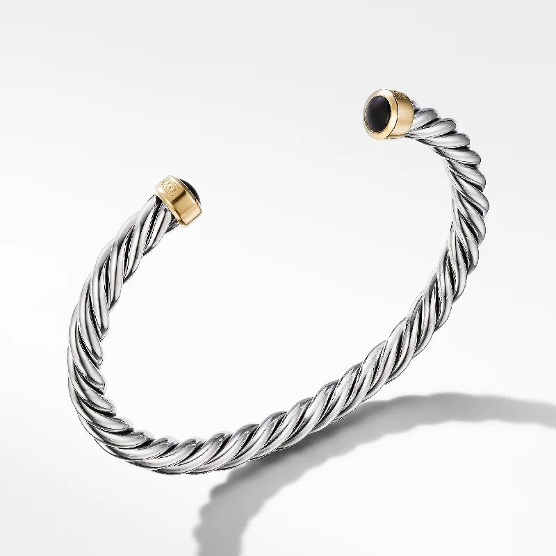 Bracelets with spiral designs for eye-catching twist -David Yurman   Bracelet in Silver and 18-Karat Yellow Gold