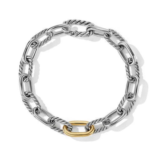 Thin bangles perfect for layering multiple styles -David Yurman The Madison® Collection Bracelet in Silver and 18-Karat Yellow Gold