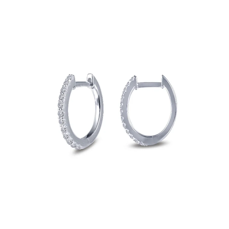 Hoop earrings with cut-out designs for a creative and lightweight effect-Oval Huggie Hoop Earrings in Sterling Silver