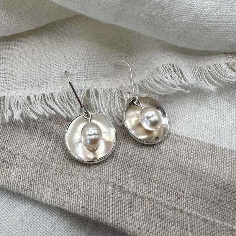 Hoop earrings with gold accents for a warm, elegant statement piece-Pearl Glow Earrings